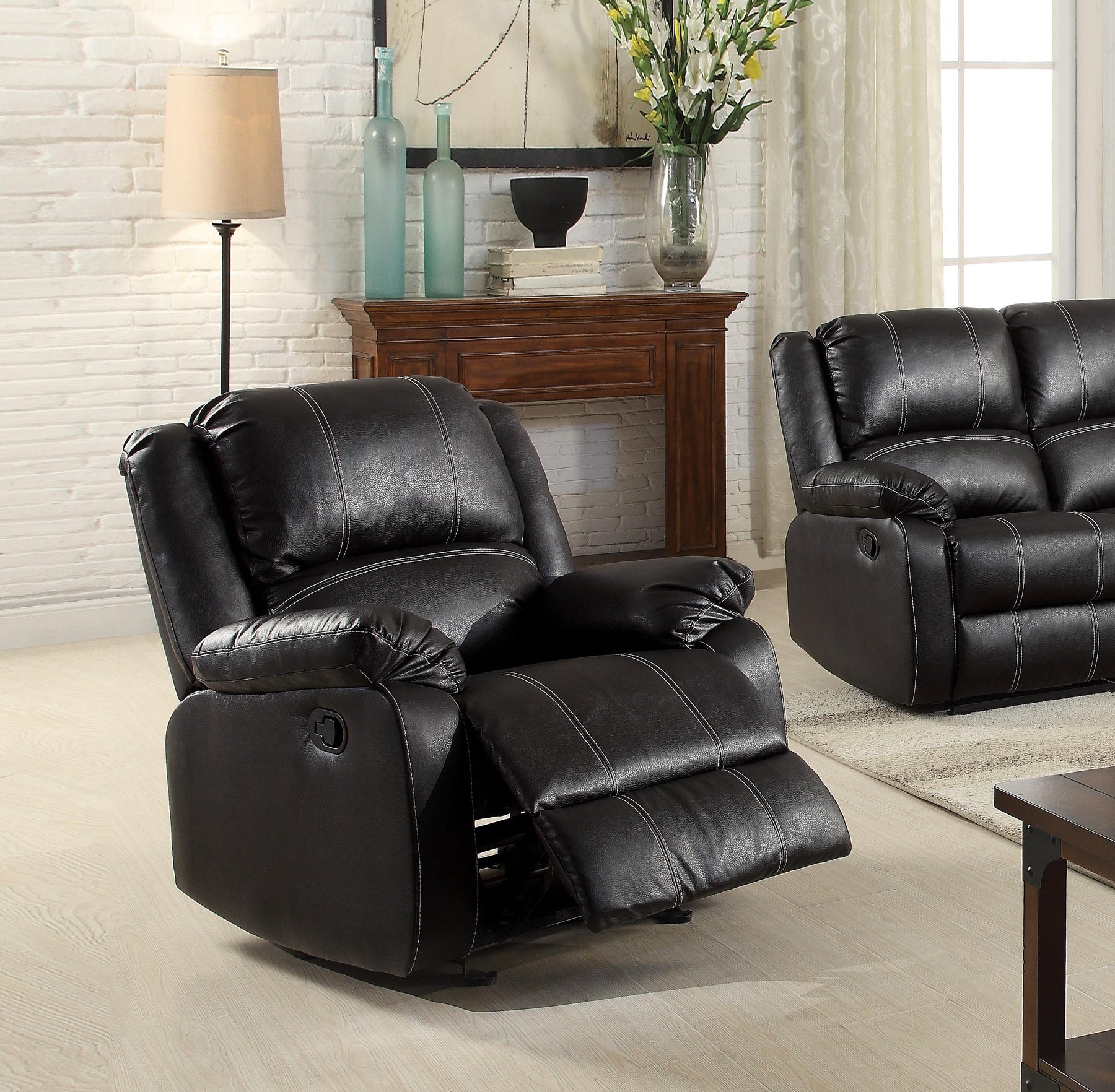 Zuriel Black PU Rocker Recliner (Motion) Half Price Furniture