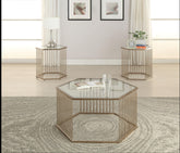 Oaklie Champagne & Clear Glass Coffee Table Half Price Furniture