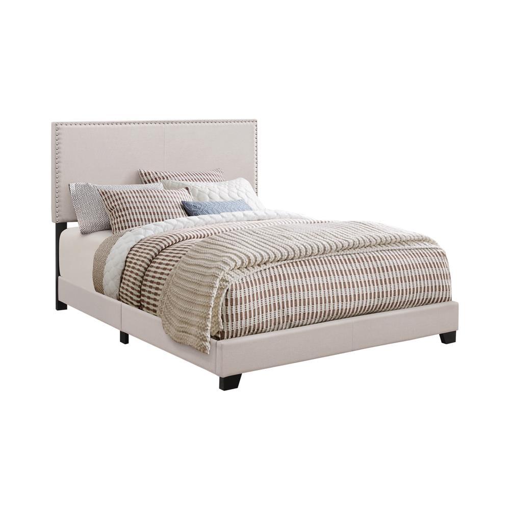 Boyd Eastern King Upholstered Bed with Nailhead Trim Ivory  Half Price Furniture