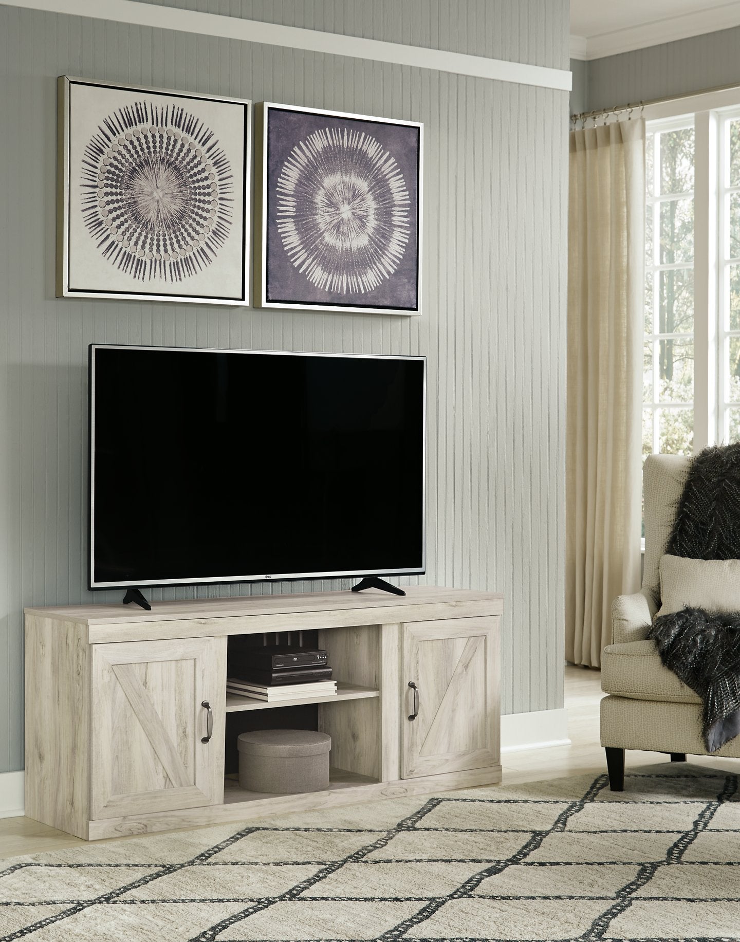 Bellaby 4-Piece Entertainment Center with Electric Fireplace - Half Price Furniture