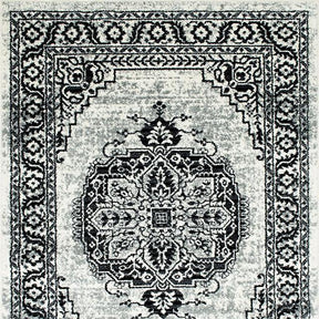 Serang Gray/Black 5' X 7' Area Rug Half Price Furniture