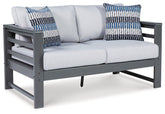 Amora Outdoor Loveseat with Cushion Half Price Furniture