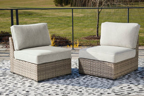 Calworth Outdoor Armless Chair with Cushion (Set of 2)  Half Price Furniture