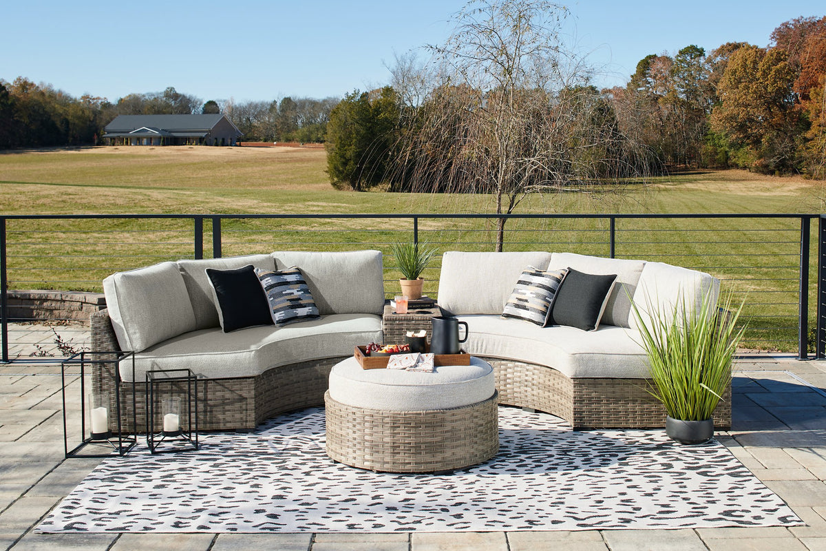 Calworth Outdoor Sectional with Ottoman - Half Price Furniture