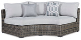 Harbor Court Curved Loveseat with Cushion Half Price Furniture