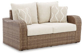 Sandy Bloom Outdoor Loveseat with Cushion Half Price Furniture