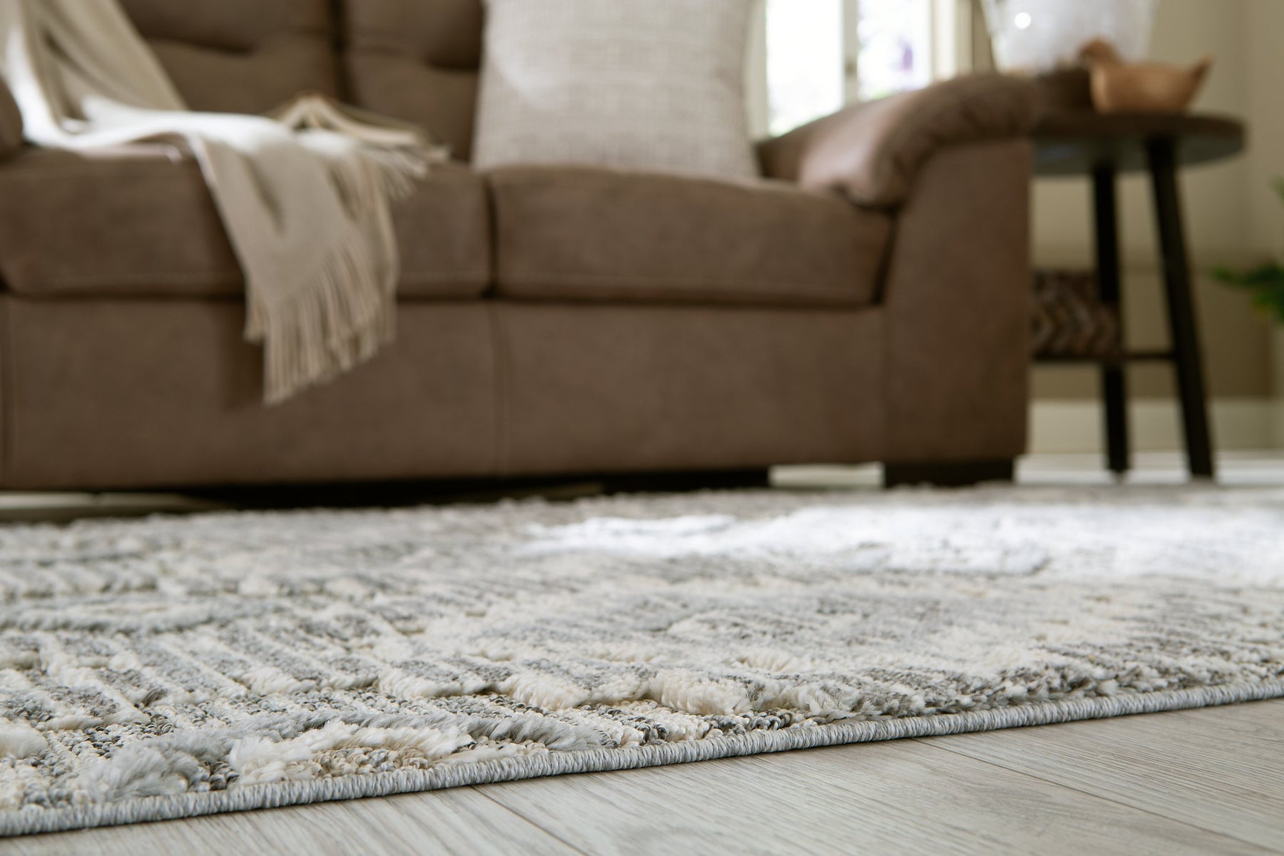 Monwick 7'10" x 10'3" Rug - Half Price Furniture