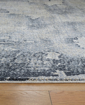 Langrich 5'3" x 7'3" Rug - Half Price Furniture