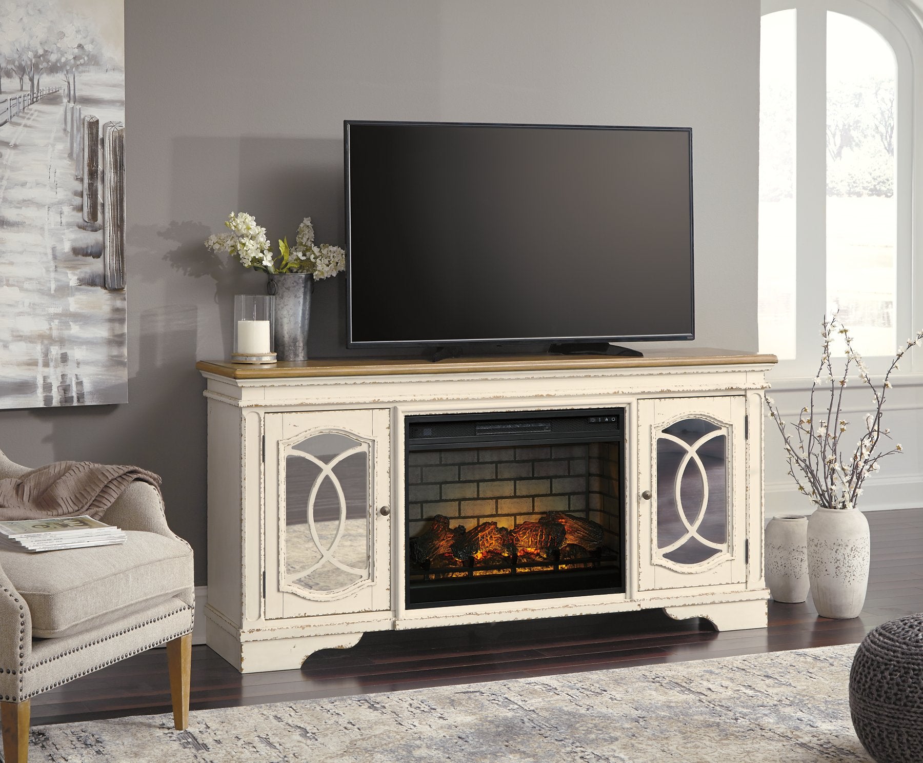 Realyn 74" TV Stand with Electric Fireplace  Half Price Furniture